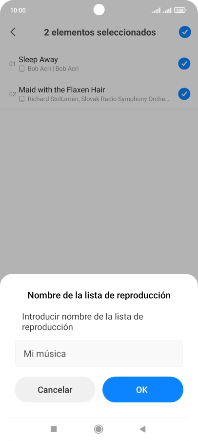 Introduce el nombre deseado de la lista de reproducción y pulsa OK.