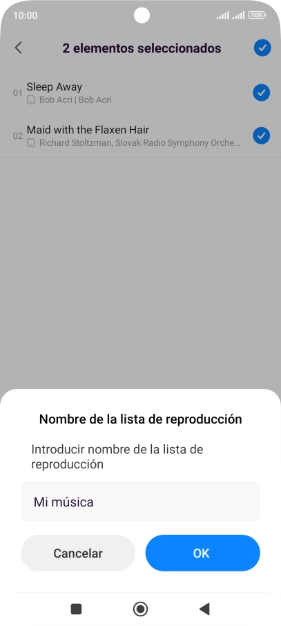 Introduce el nombre deseado de la lista de reproducción y pulsa OK.