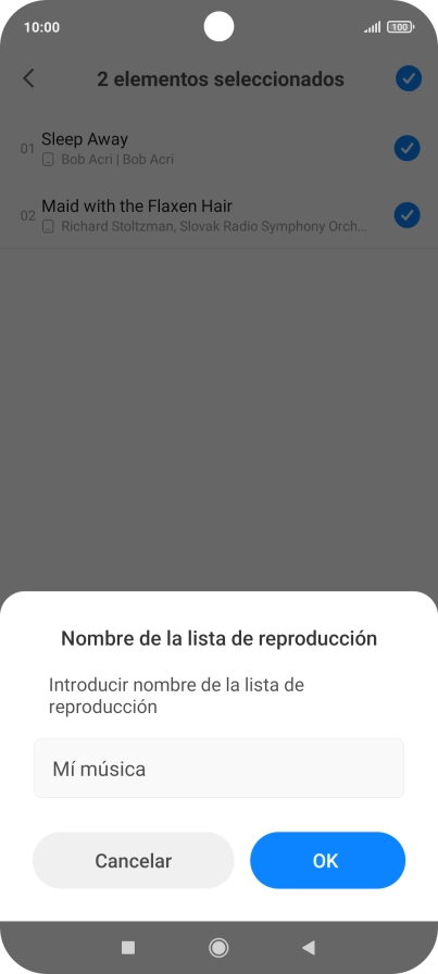 Introduce el nombre deseado de la lista de reproducción y pulsa OK.