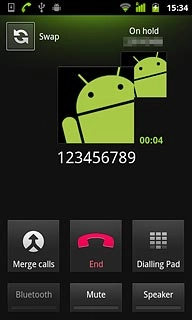 Make sure the call you want to end is active.Press End.The active call is ended and the call on hold is automatically activated.