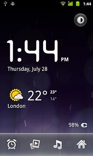 Press the alarm icon.