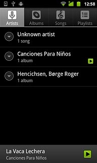 Press one of the following categories at the top of the display:Artists
