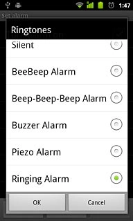 Once you've found an alarm tone you like, press OK.