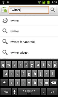 Key in Twitter and press the search icon.