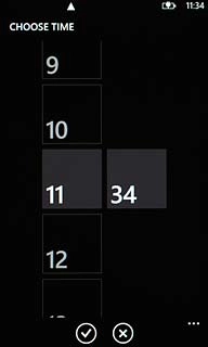 Press hours and minutes and key in the required time.