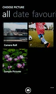 To take a new picture:Press the camera icon.