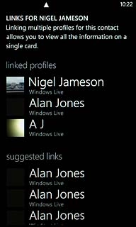A list of automatically merged contacts is displayed below linked profiles.