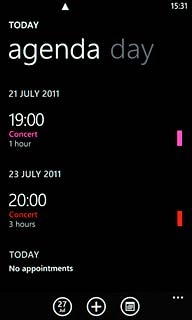 To go to month view:Press the month view icon.