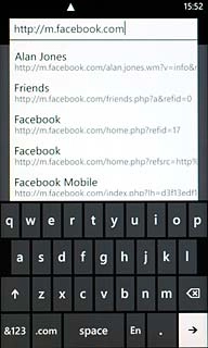 Key in http://m.facebook.com and press arrow right.