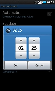 Press + or - next to hours and minutes to set the time.