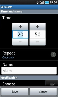 Press + or - next to hours and minutes to set the time.