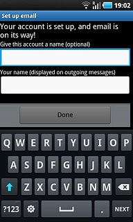 Press the field below Your name (displayed on outgoing messages) and key in the required sender name.
