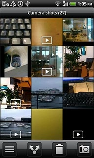Go to the required folder.Press and hold the required picture or the required video clip until a pop-up menu is displayed.