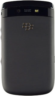 Turn the back of your phone towards you.Slide the back cover downwards and remove it.