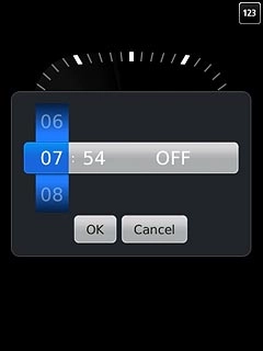 Press anywhere on the display.Slide the numbers up or down to set the time for the alarm.
