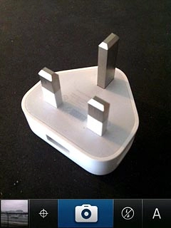 Press the camera icon to take the picture.Follow the instructions on the display to key in text and select a photo album.