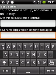 Press the field below Your name (displayed on outgoing messages) and key in the required sender name.