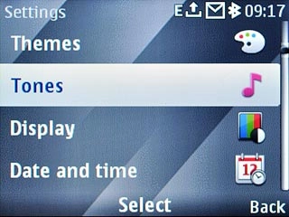Scroll to Tones and press the Navigation key.