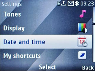 Scroll to Date and time and press the Navigation key.