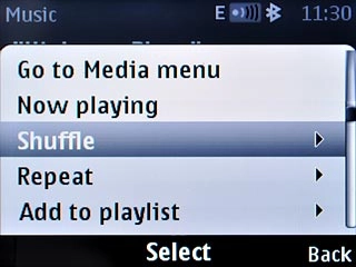 Scroll to Shuffle and press the Navigation key.