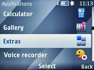 Scroll to Extras and press the Navigation key.