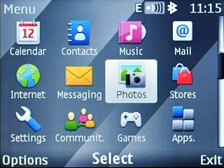 Scroll to Photos and press the Navigation key.