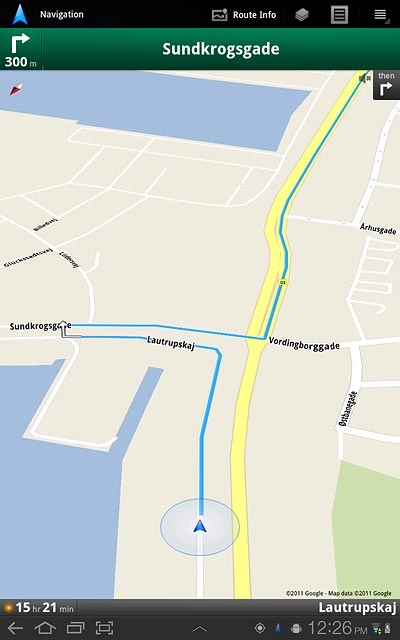 The navigation window with information about your route is displayed.The next turn and the next route detail are displayed at the top of the display.