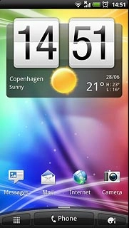 The alarm icon shows that the alarm is set.Further information:Set the alarm