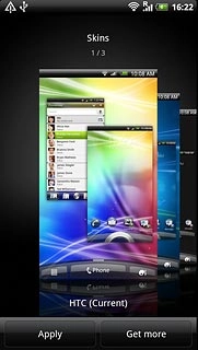 Slide your finger right or left on the display to select the required theme.
