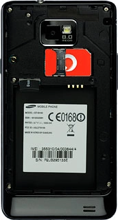 Slide the memory card into the holder and press it until it clicks into place.