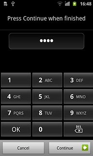 Key in the required phone lock code and press Continue.