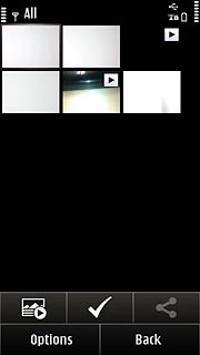 Go to the required folder.Press and hold the required picture or the required video clip until a pop-up menu is displayed.