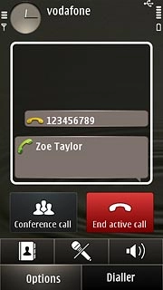 The calls are displayed on a list and the active call is displayed at the bottom.Press Options.