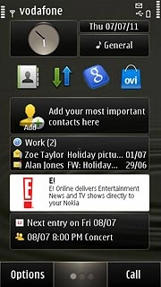 Press the dots at the bottom of the display to select the required standby display.