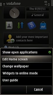 Press Edit Home screen.Choose one of the following options:Select background image, go to 1a.Organise display shortcuts, go to 1b.