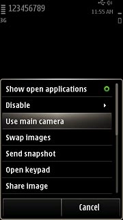 Press Use main camera or Use secondary camera (depending on the current setting).