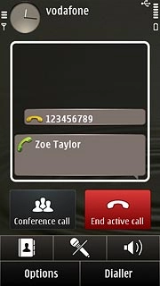 Make sure the call you want to end is active.Press End active call.The active call is ended and the call on hold is automatically activated.
