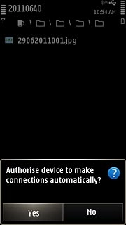 Press Yes or No to select automatic connection when the devices are turned on.You also need to accept the transfer on the other device.The file is sent.