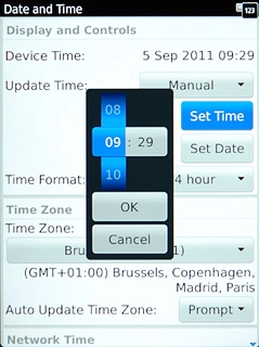 Slide hours and minutes up or down to set the time.