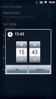 Press + or - next to hours and minutes to set the time.