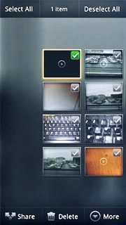 When a picture or video clip is ticked (V), it's selected.