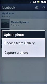 To upload a saved picture:Press Choose from Gallery.