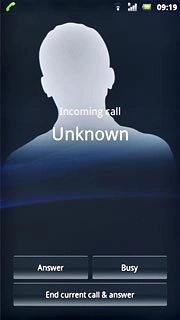 When you have an ongoing call, the new call is signalled by a sound.Press Answer.