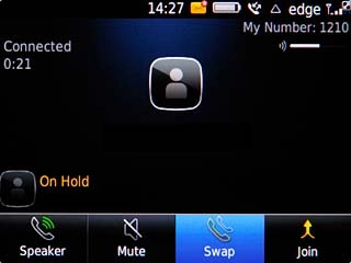Scroll to Swap and press the Navigation key to swap calls.