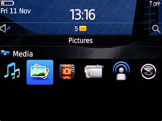 Highlight Pictures or Videos and press the Navigation key.Go to the required folder.