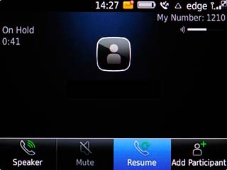 Scroll to Resume and press the Navigation key to resume the ongoing call.