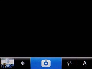 Scroll to the camera icon and press the Navigation key to take a picture.