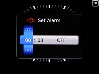 Highlight hours and minutes and slide up or down to set the time for the alarm.