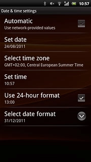 Press Automatic to turn automatic date and time update on or off.