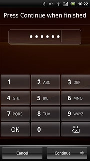 Key in the required phone lock code and press Continue.